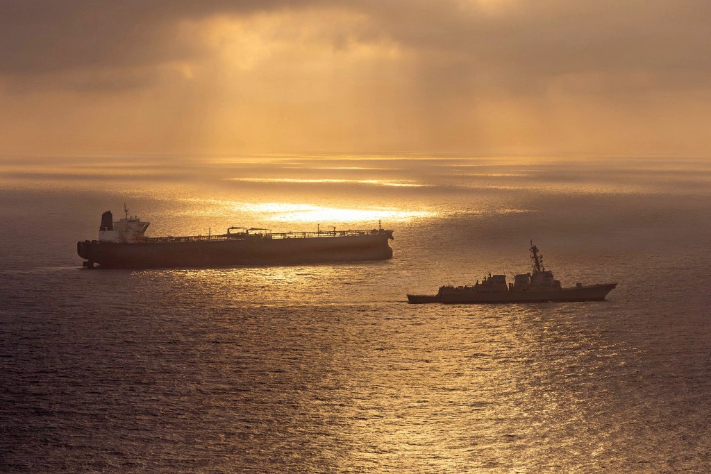 The Arleigh Burke-class guided-missile destroyer USS Rafael Peralta (DDG 115) implementing a maritime blockade against the Iran-flagged crude oil tanker vessel Herby while the latter was attempting to sail toward an Iranian port, on April 24. (AFP)