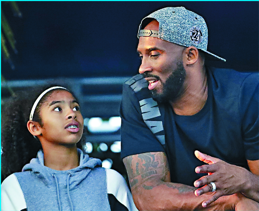 Kobe Bryant and daughter Gigi. AP Kobe Bryant and daughter Gigi. AP