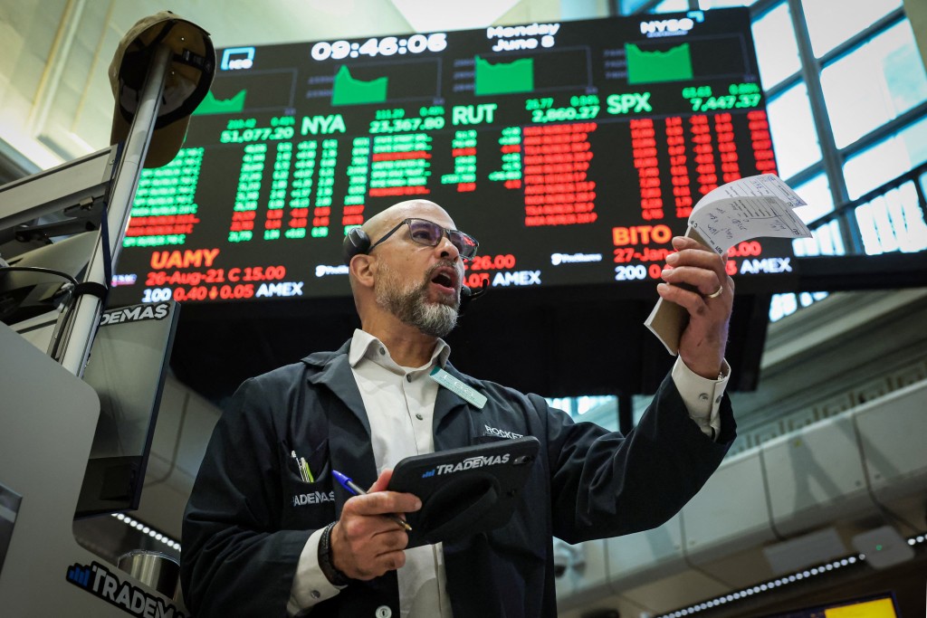 A futures-options trader works on the floor at the New York Stock Exchange's NYSE American (AMEX) in New York City, U.S. June 8, 2026.  REUTERS/Brendan McDermid