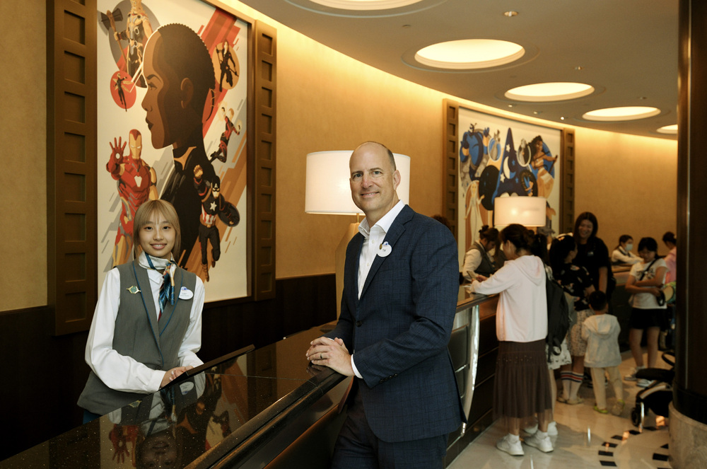 Tim Sypko, left, talking with hotel staff, says a talent fair will be held next week at Disneyland, where World of Frozen will replicate scenes of the hit animated movies when it opens in November. SING TAO Tim Sypko, left, talking with hotel staff, says a talent fair will be held next week at Disneyland, where World of Frozen will replicate scenes of the hit animated movies when it opens in November. SING TAO