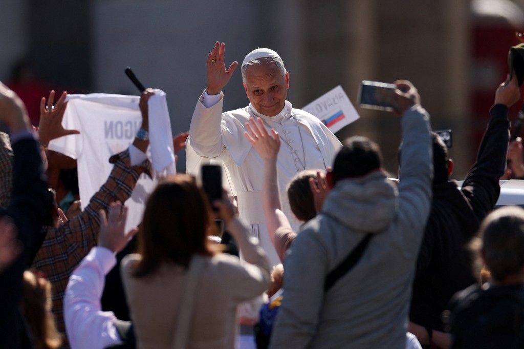 Pope Leo XIV waves to the faithful from the Popemobile (Papamobile) on the day of the canonisation of seven new saints, including former Satanist-turned-Catholic Bartolo Longo, in St. Peter's Square at the Vatican, October 19, 2025. (Reuters)