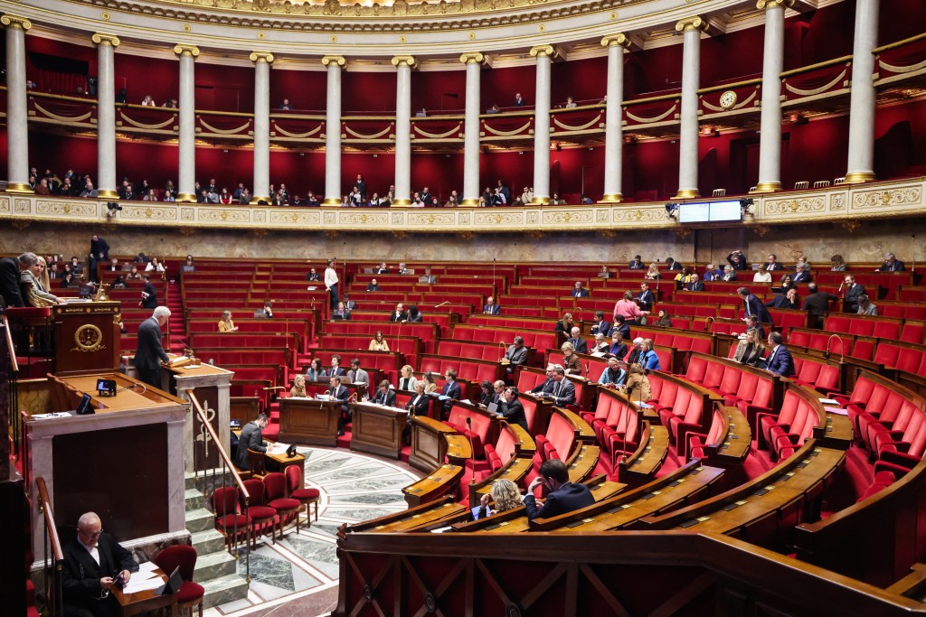 MPs attend a parliamentary debate on legislative process for a social media ban on under-15s at the Assemblee Nationale, France's lower house Parliament in Paris on January 26, 2026.  Photo by LUDOVIC MARIN / AFP