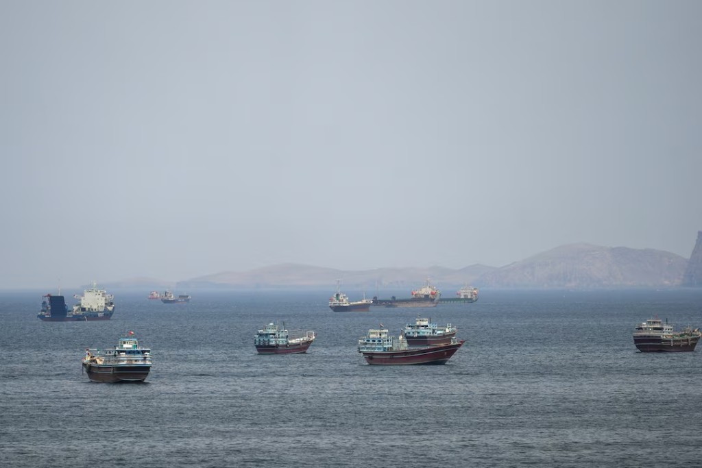 Ships and boats in the Strait of Hormuz, Musandam, Oman, April 22, 2026. REUTERS/Stringer 