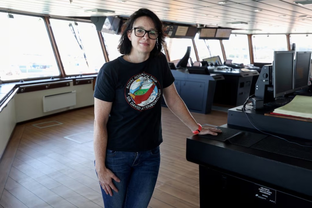  Dr Kelly Hogan, marine geophysicist, British Antarctic Survey, poses aboard the RRS Sir David Attenborough during a tour of the vessel ahead of a mission to Greenland to study how warming affects the ice sheet and improve forecasts of its impact on the Atlantic, in Harwich, Britain, July 14, 2026. REUTERS/Chris Radburn