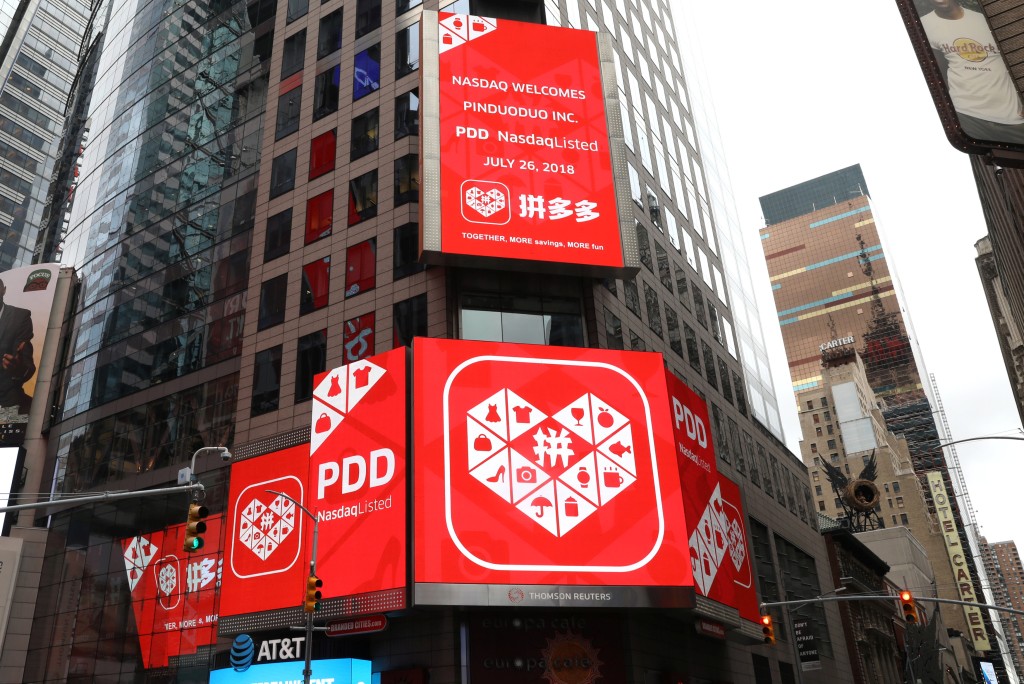 A display at the Thomson Reuters building shows a message after Chinese online group discounter Pinduoduo Inc. (PDD) was listed on the Nasdaq exchange in Times Square in New York City, New York, U.S., July 26, 2018. REUTERS/Mike Segar