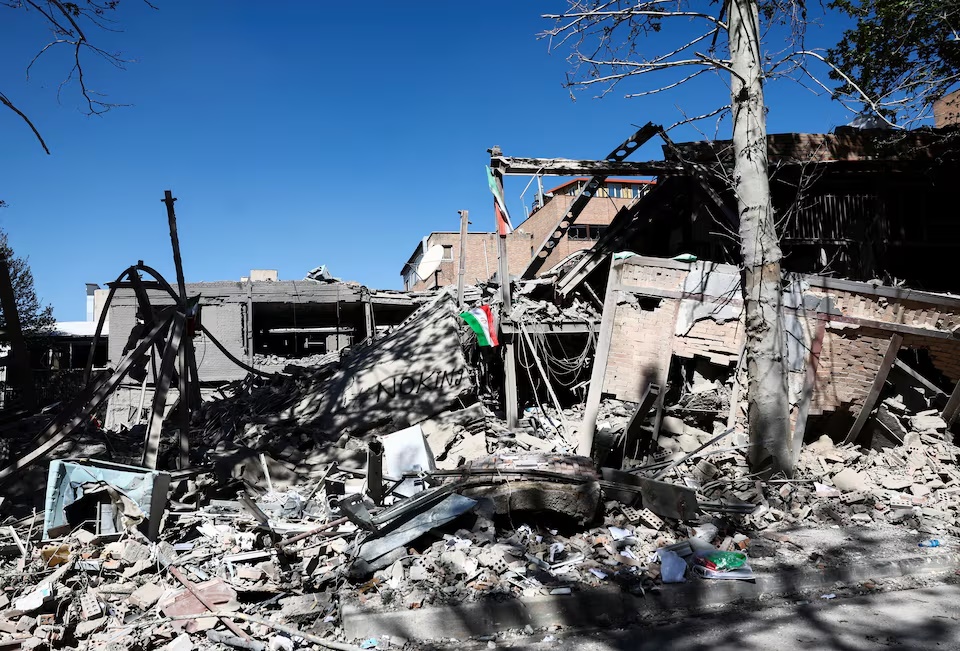 An Iranian flag lies amidst the rubble of a building of the Sharif University of Technology, which was damaged in a strike, amid the U.S.-Israeli conflict with Iran, in Tehran, Iran, April 7, 2026. Majid Asgaripour/WANA (West Asia News Agency) via REUTERS 
