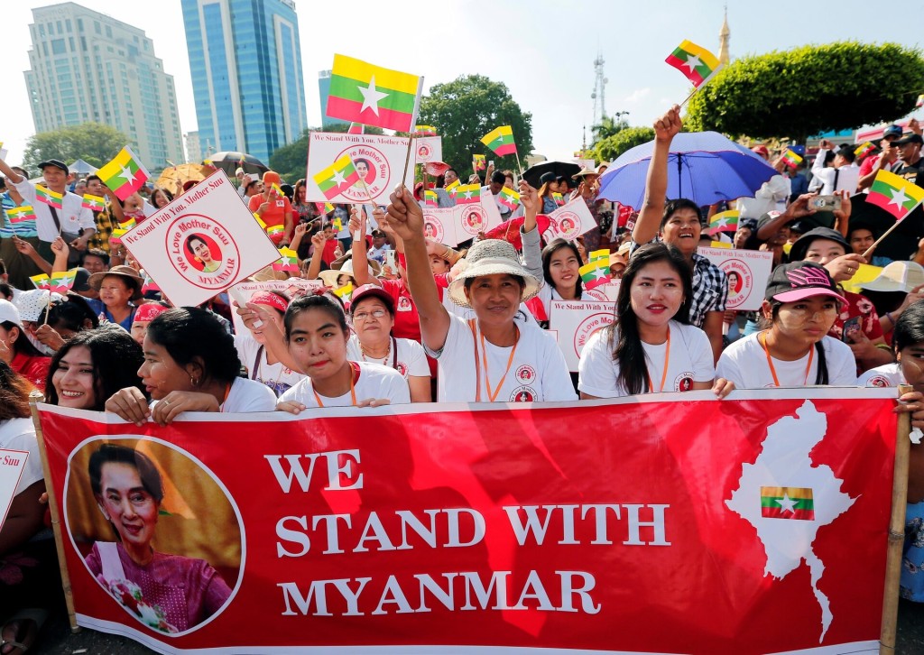 People gather to rally in support of Myanmar State Counsellor Aung San Suu Kyi before she heads off to the International Court of Justice (ICJ), in Yangon, Myanmar December 1, 2019. REUTERS/Myat Thu Kyaw