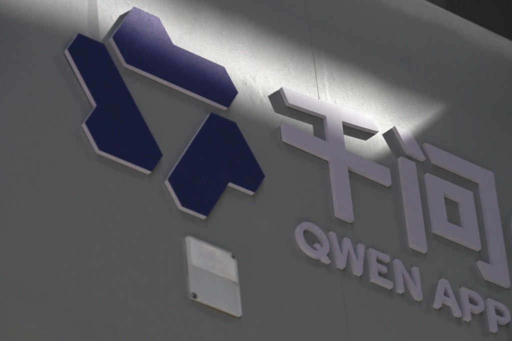 A logo of Alibaba AI product QWen is pictured during a tour at the Alibaba office in Beijing on April 1, 2026.