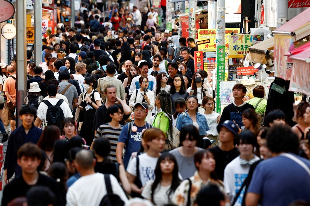 People walk along Takeshita street at Harajuku shopping area in Tokyo, Japan, August 10, 2024. REUTERS/Willy Kurniawan.