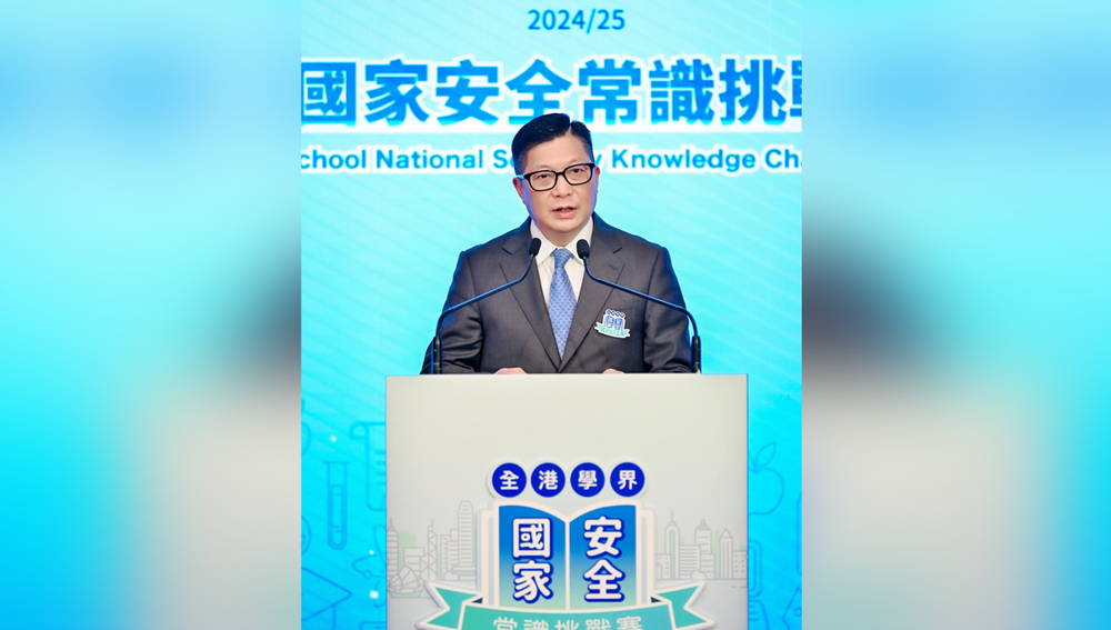 Officiating at the ceremony, the Secretary for Security, Mr Tang Ping-keung.