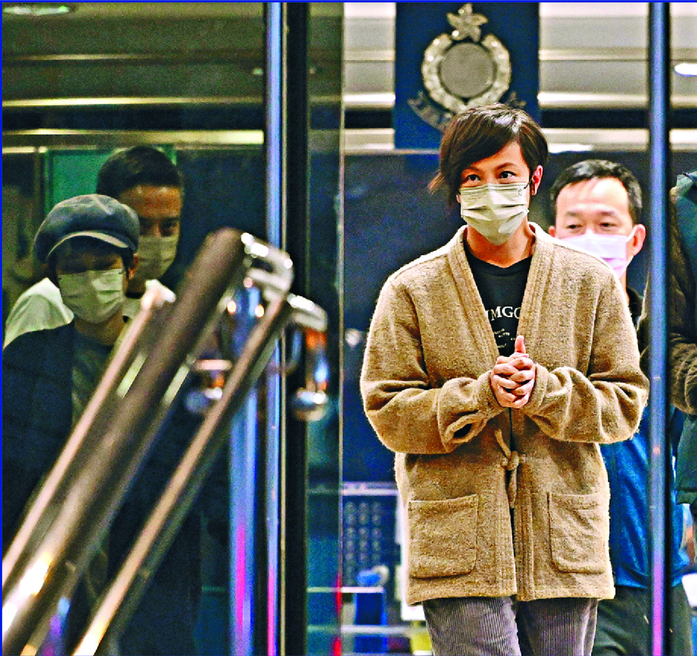 Patrick Lam, top left, and Chung Pui-kuen remain in jail custody as Denise Ho regains her freedom after yesterday's hearing. SING TAO Patrick Lam, top left, and Chung Pui-kuen remain in jail custody as Denise Ho regains her freedom after yesterday's hearing. SING TAO