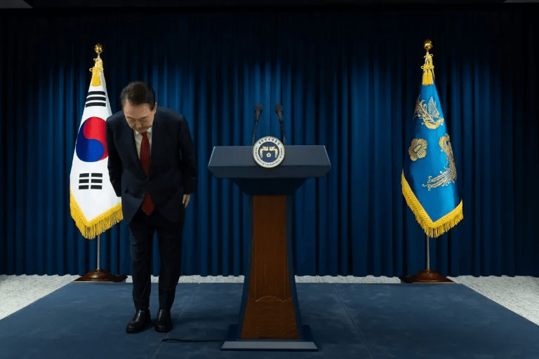 South Korean President Yoon Suk Yeol bows after apologising for his declaration of martial law in a nationally televised speech (Handout) (Handout/South Korean Presidential Office/AFP) South Korean President Yoon Suk Yeol bows after apologising for his declaration of martial law in a nationally televised speech (Handout) (Handout/South Korean Presidential Office/AFP)