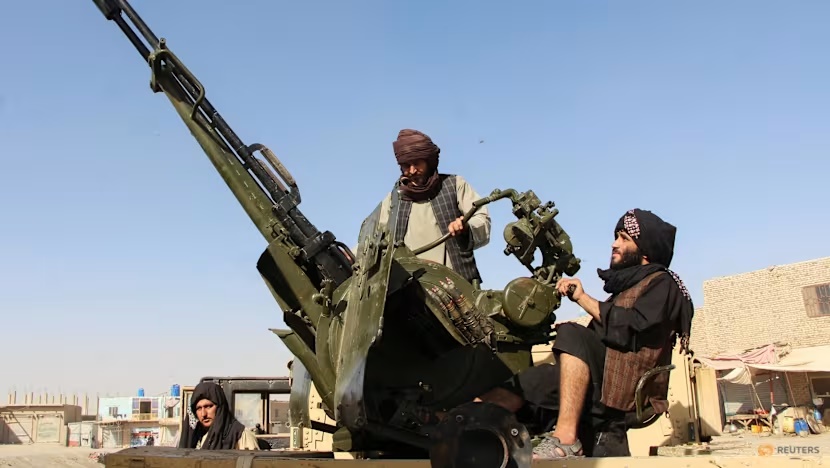 An Afghan Taliban fighter sit next to an anti-aircraft gun near the Afghanistan-Pakistan border in Spin Boldak, Kandahar Province, following exchanges of fire between Pakistani and Afghan forces in Afghanistan on Oct 15, 2025. (Photo: Reuters/Stringer)