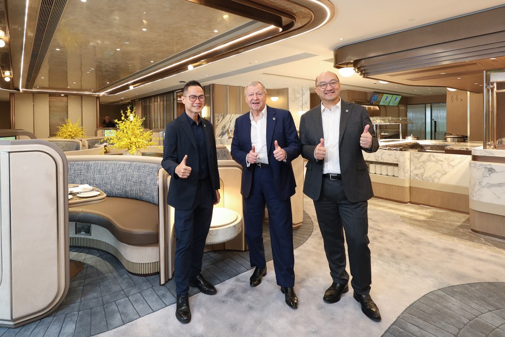 The Hong Kong Jockey Club’s chief executive officer Winfried Engelbrecht-Bresges (centre), executive director, customer strategy, insights and innovation Dennis Hau (left), and executive director, corporate affairs Raymond Tam (right) congratulate on the reopening of Inner Circle after enhancement. 