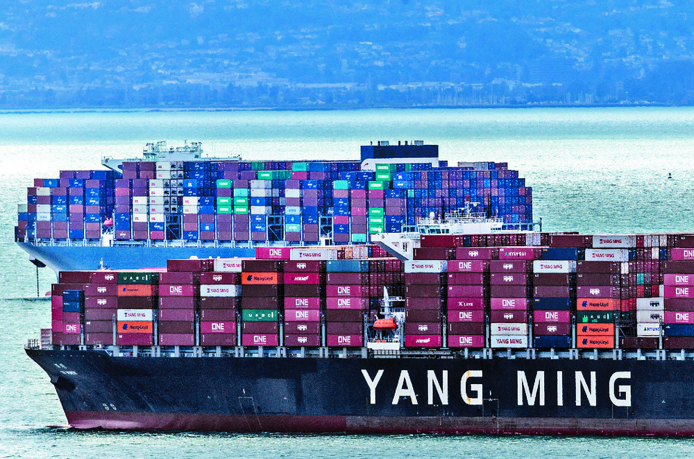 Cargo ships at the Port of Oakland. Left: Google, which is being probed by China. REUTERS Cargo ships at the Port of Oakland. Left: Google, which is being probed by China. REUTERS