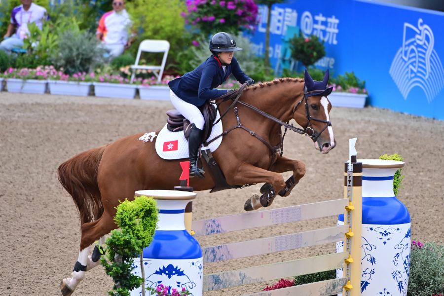 Jacqueline Lai competing in the equestrian competition. Jacqueline Lai competing in the equestrian competition.