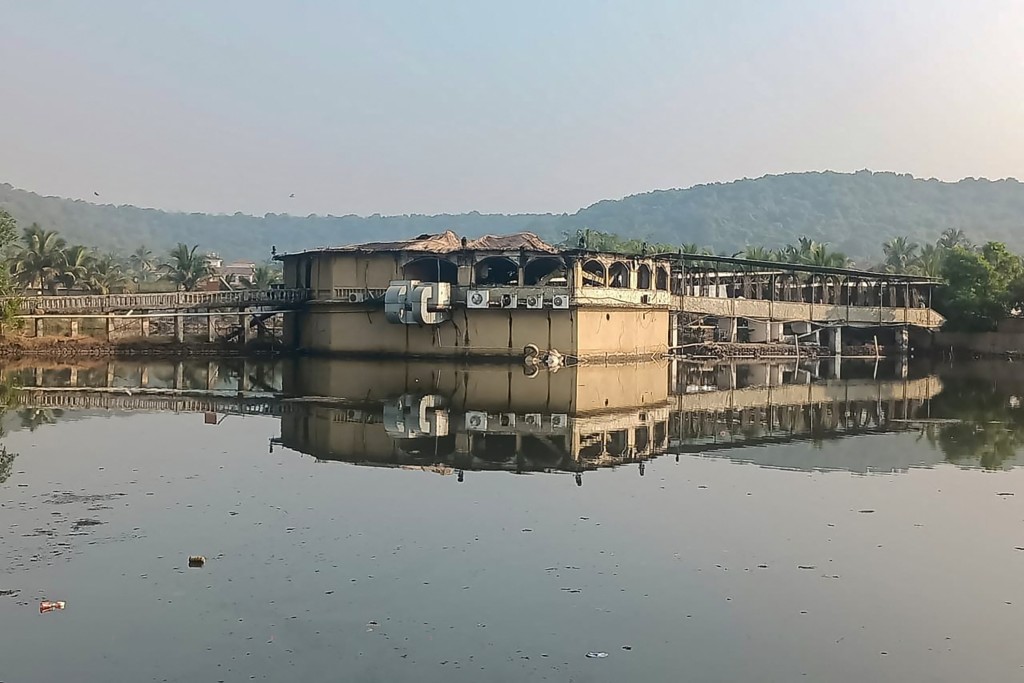 A general view shows the burned nightclub following a fire that broke out last midnight in Goa on December 7, 2025. (AFP)