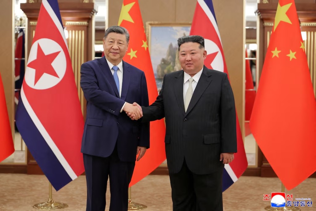 Chinese President Xi Jinping shakes hands with North Korean leader Kim Jong Un during Xi's state visit to Pyongyang, North Korea, June 8, 2026, in this picture released by North Korea's official Korean Central News Agency. KCNA via REUTERS 