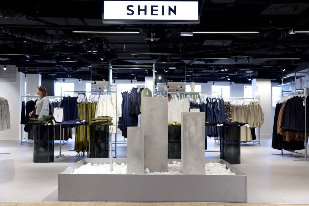A customer walks through the Asian e-commerce giant Shein's store at the Bazar de l'Hotel de Ville (BHV) department store in Paris on March 19, 2026. AFP