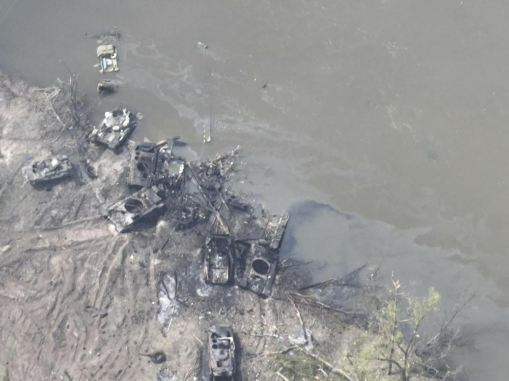 Dozens of destroyed or damaged Russian armored vehicles on both banks of Siverskyi Donets River. (AP) Dozens of destroyed or damaged Russian armored vehicles on both banks of Siverskyi Donets River. (AP)