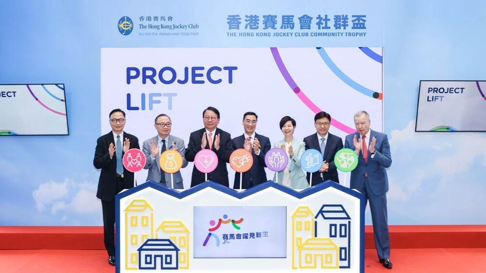 HKSAR Government Chief Secretary for Administration Chan Kwok-ki (3rd left), Secretary for Housing Winnie Ho (3rd right), Secretary for Labour and Welfare Chris Sun (2nd right), Club Chairman Michael Lee (centre), Club Deputy Chairman Martin Liao (2nd left), Club Chief Executive Officer Winfried Engelbrecht-Bresges (1st right) and JC PROJECT LIFT Advisory Committee Convenor Clement Cheung (1st left) officiate at the JC PROJECT LIFT announcement ceremony at The Hong Kong Jockey Club Community Day. HKSAR Government Chief Secretary for Administration Chan Kwok-ki (3rd left), Secretary for Housing Winnie Ho (3rd right), Secretary for Labour and Welfare Chris Sun (2nd right), Club Chairman Michael Lee (centre), Club Deputy Chairman Martin Liao (2nd left), Club Chief Executive Officer Winfried Engelbrecht-Bresges (1st right) and JC PROJECT LIFT Advisory Committee Convenor Clement Cheung (1st left) officiate at the JC PROJECT LIFT announcement ceremony at The Hong Kong Jockey Club Community Day.