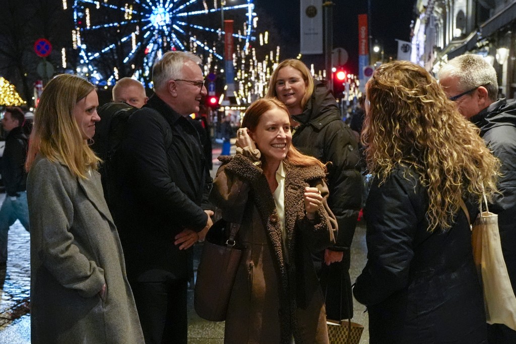 Ana Corina Sosa (C), daughter of Nobel Peace Prize 2025 laureate Venezuelan opposition leader Maria Corina Machado, arrive at the Grand Hotel in Oslo on December 8, 2025, a few days ahead of the Nobel Peace Prize award ceremony. (Photo by Lise Åserud / NTB / AFP)