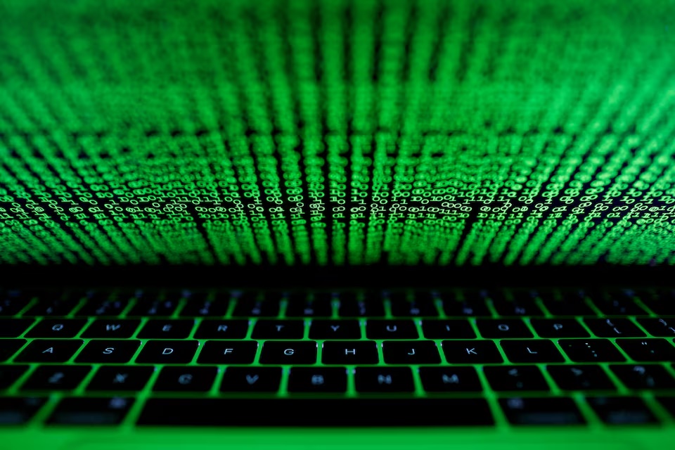 A computer keyboard lit by a displayed cyber code is seen in this illustration picture taken on March 1, 2017. REUTERS/Kacper Pempel/Illustration/File Photo A computer keyboard lit by a displayed cyber code is seen in this illustration picture taken on March 1, 2017. REUTERS/Kacper Pempel/Illustration/File Photo