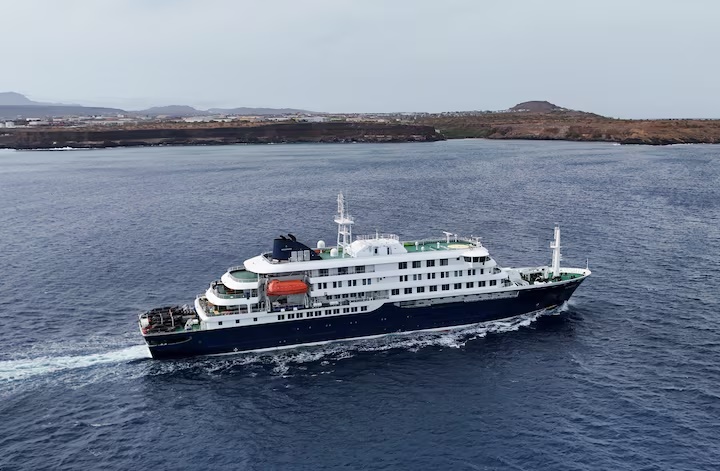 A drone view of the cruise ship MV Hondius, carrying passengers suspected of having cases of hantavirus on board, leaves Praia, Cape Verde, May 6, 2026. REUTERS/Stringer