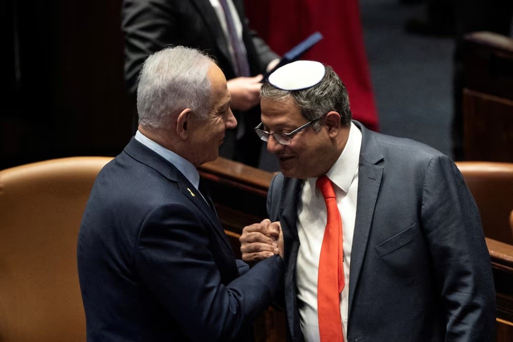  Israel Prime minister Benjamin Netanyahu and Itamar Ben Gvir shake hands as the Israeli government approve Netanyahu's proposal to reappoint Itamar Ben-Gvir as minister of National Security, in the Knesset, Israeli parliament in Jerusaelm, March 19, 2025 REUTERS/Oren Ben Hakoon 