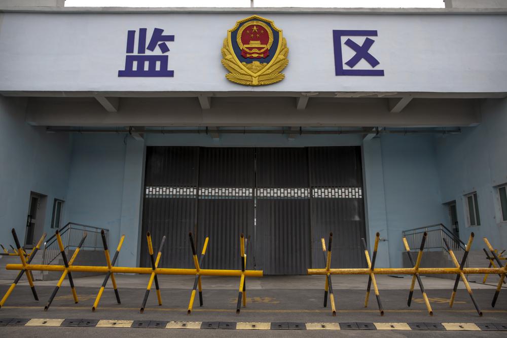Barricades stand in front of a vehicle entrance to the inmate detention area at the Urumqi No. 3 Detention Center in Dabancheng in western China's Xinjiang Uyghur Autonomous Region on April 23, 2021. Urumqi No. 3, China's largest detention center, is twice the size of Vatican City and has room for at least 10,000 inmates. 