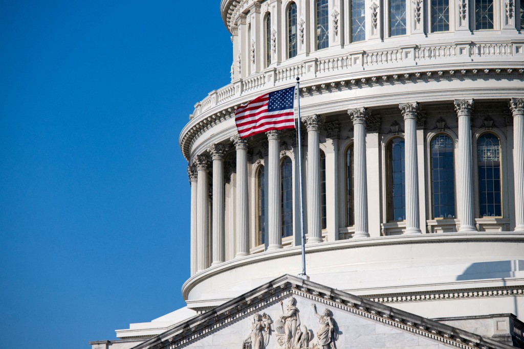 The American flag waves from the U.S. Capitol in Washington, D.C., U.S., March 1, 2026. REUTERS/Annabelle Gordon