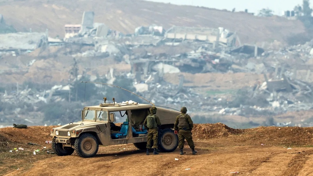 Israeli soldiers patrol along the Israel-Gaza border on December 27, 2023. Jack Guez/AFP/Getty Images Israeli soldiers patrol along the Israel-Gaza border on December 27, 2023. Jack Guez/AFP/Getty Images
