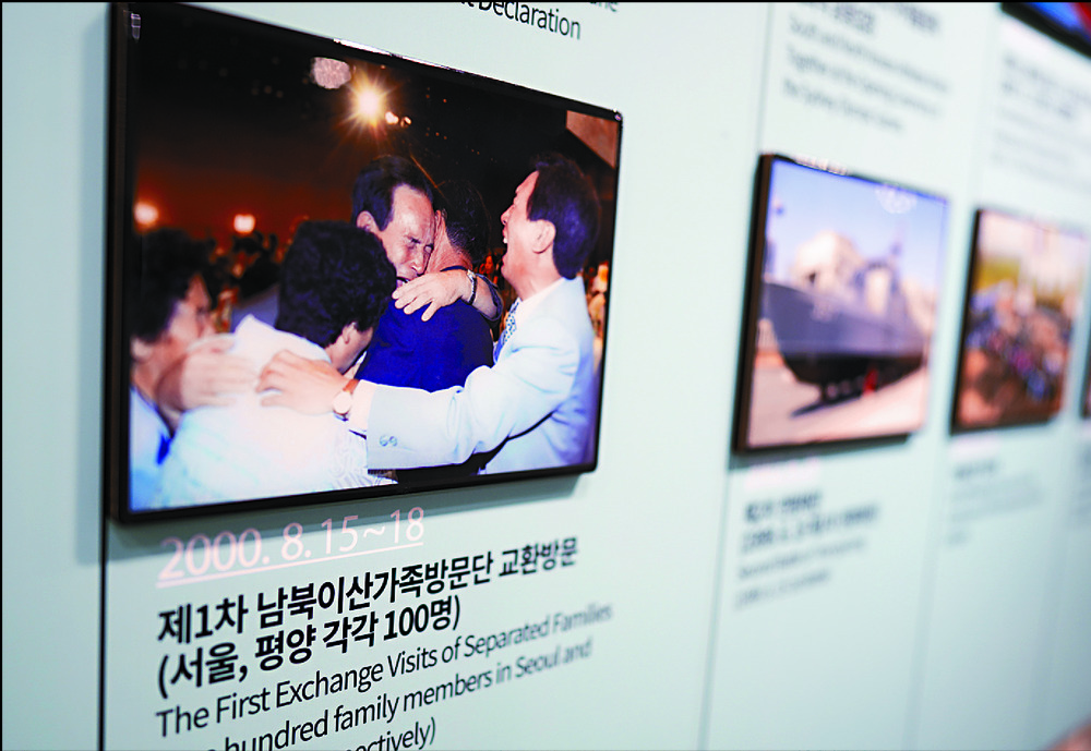 Pictures of reunited families are displayed at the exhibition hall of the unification observatory in the border town of Paju, South Korea. AP Pictures of reunited families are displayed at the exhibition hall of the unification observatory in the border town of Paju, South Korea. AP