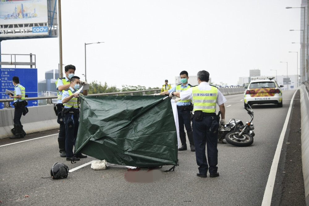 Motorcyclist killed after being run over by tour bus