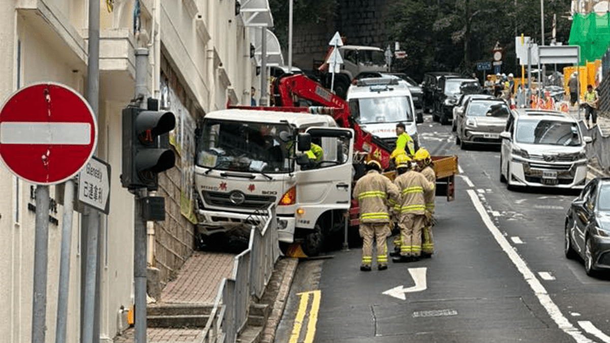 Crane truck rolls downhill in Central, hits kindergarten wall