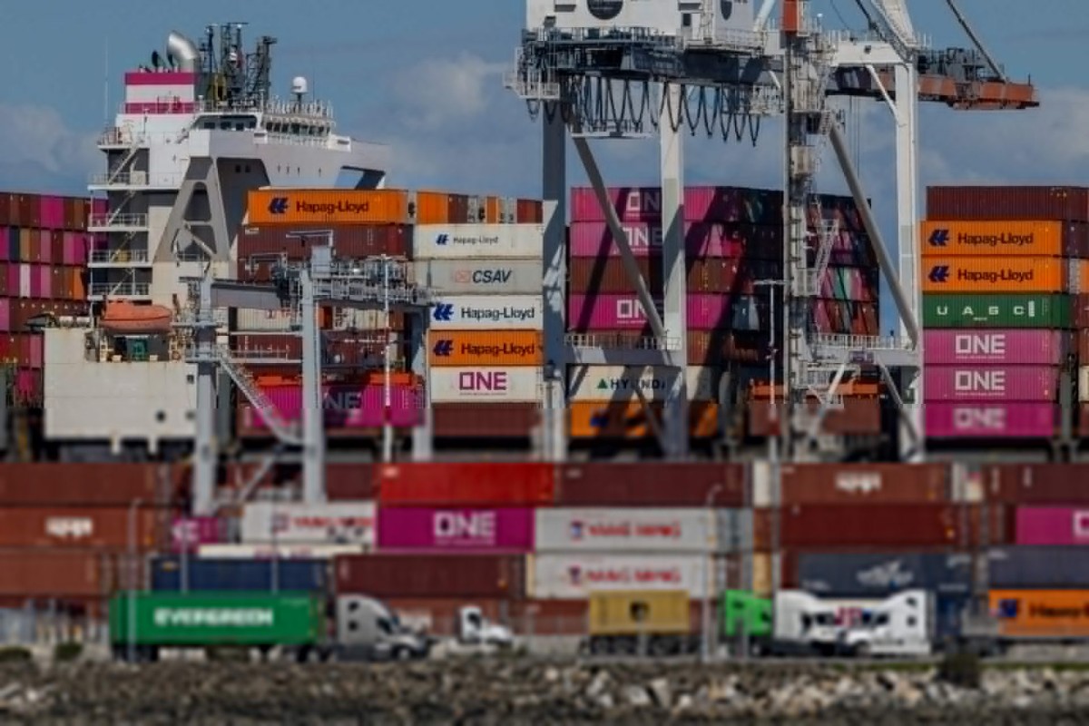 US trade deficit widens in February as imports offset record exports
