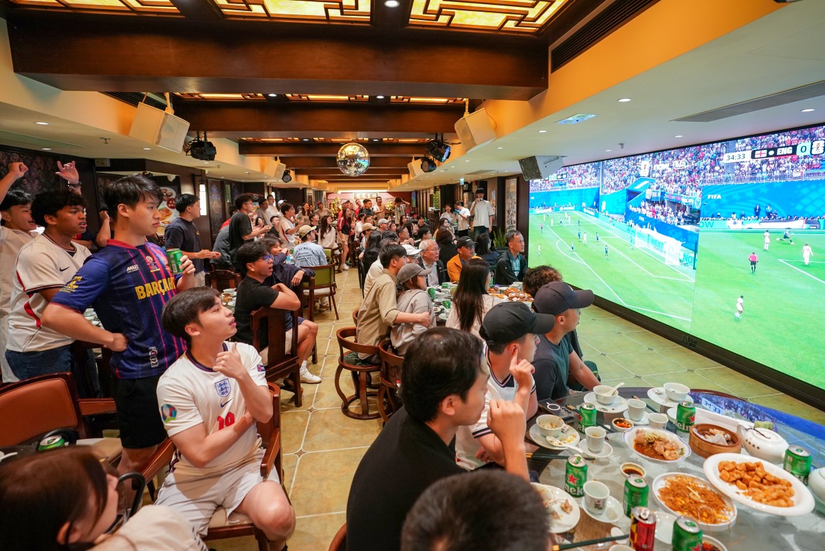 thestandard.com.hk - The Standard 英文虎報 - Cheers with hot tea: World Cup final set to pour millions revenue into Hong Kong eateries