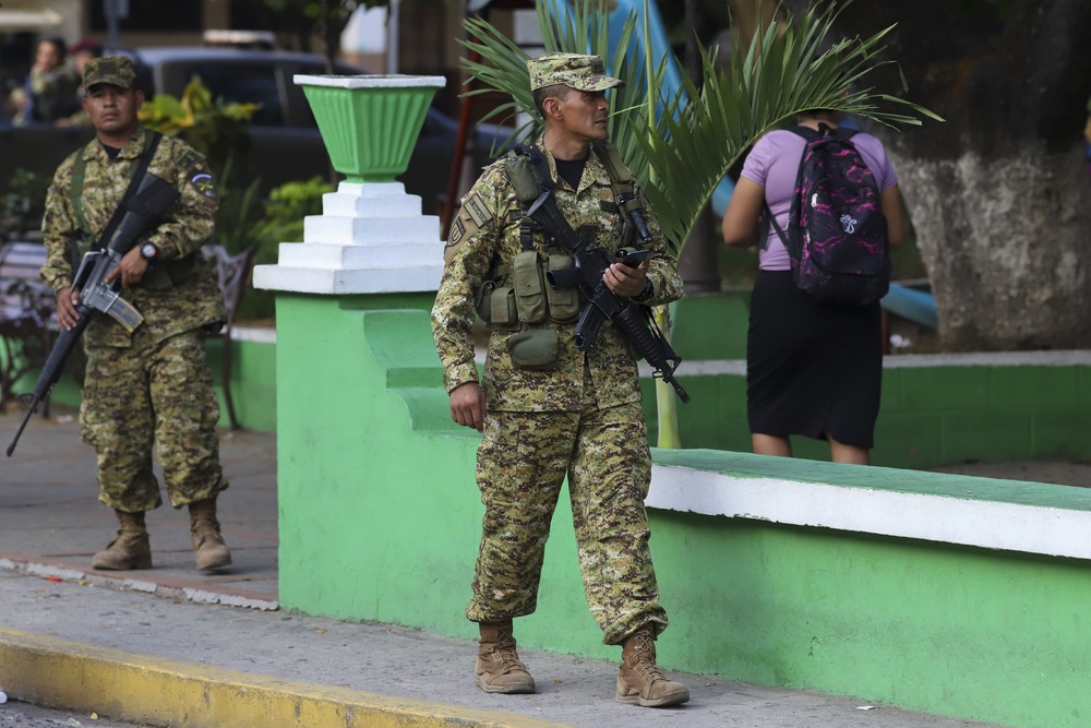 Three arrested in El Salvador police officer's killing after siege