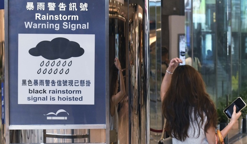 Clock Rainstorm Black rainstorm warning in force as heavy rain disrupts schools and clinics