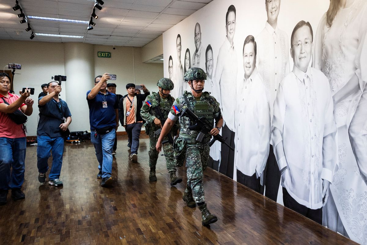 Gunshots fired in standoff at Philippine Senate over ICC suspect